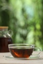 Cup of aromatic tea on white table. Space for text Royalty Free Stock Photo