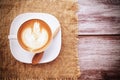 A cup of art latte or cappuccino coffee Royalty Free Stock Photo