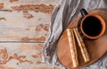 Cup of autumn tea with note book and yellow dry leaves near a window, copy space. Hot drink for autumn cold rainy days. Hygge Royalty Free Stock Photo