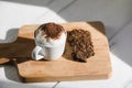 Cup of Babyccino with dark chocolate cookies Royalty Free Stock Photo