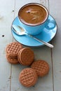 A cup of black coffee and chocolate biscuits Royalty Free Stock Photo