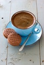 A cup of black coffee and chocolate biscuits Royalty Free Stock Photo
