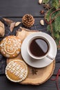 Cup of black coffee with Christmas gingerbread cookies on black Royalty Free Stock Photo