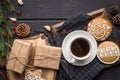 Cup of black coffee with Christmas gingerbread cookies