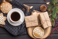 Cup of black coffee with Christmas gingerbread cookies on black Royalty Free Stock Photo