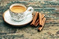 Cup of black coffee with cinnamon spices. Creative food Royalty Free Stock Photo