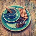 Cup of black coffee with cinnamon and star anise spices Royalty Free Stock Photo