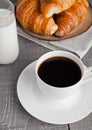 Cup of black coffee and croissant and milk Royalty Free Stock Photo