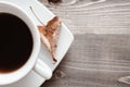 Cup of black coffee and dry leaf Royalty Free Stock Photo