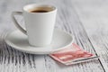 Cup of black coffee and euro banknotes Royalty Free Stock Photo