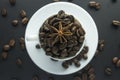 Cup of black coffee with foam on background of roasted coffee beans Royalty Free Stock Photo