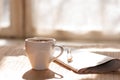 Cup of black coffee, newspaper and a pen against Royalty Free Stock Photo