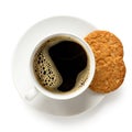 Cup of black coffee with one and half crunchy oat and wholemeal biscuits isolated on white. White porcelain. Top view