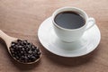 Cup of black coffee over wood background Royalty Free Stock Photo