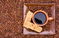 Cup of black coffee and rusks viewed from the top Royalty Free Stock Photo
