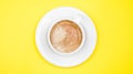 A cup of black coffee on yellow background. View from above. copy space Royalty Free Stock Photo