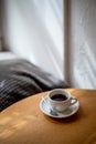 Cup of black filter coffee on the table in coffee house cafe coffeebreak sunlight daylight