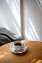 Cup of black filter coffee on the table in coffee house cafe coffeebreak sunlight daylight