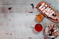 Cup of black tea with berry marshmallow and biscuits and jar of jam flat lay. Tea brake set Royalty Free Stock Photo