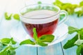 Cup of black tea with fresh mint Royalty Free Stock Photo