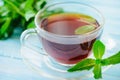 Cup of black tea with fresh mint Royalty Free Stock Photo