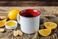 Cup of black tea with honey, lemon and ginger Royalty Free Stock Photo