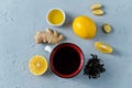 Cup of black tea with honey, lemon and ginger Royalty Free Stock Photo