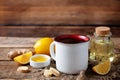 Cup of black tea with honey, lemon and ginger Royalty Free Stock Photo