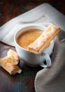 Cup of caffe crema with french pastries Royalty Free Stock Photo