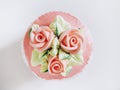 Cup cake dessert with Rose and flower decoration Top view