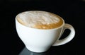 Cup cappuccino on the black Royalty Free Stock Photo