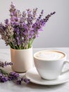 Cup of cappuccino and bouquet of lavender flowers in a vase.