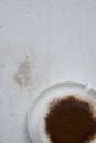 Cup of cappuccino withcacao on white background