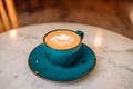 Cup of cappuccino coffee and beautiful heart Latte Art at city cafe shop, Valentine's day concept Royalty Free Stock Photo