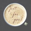 Cup of cappuccino coffee with foam in the form of words Just for