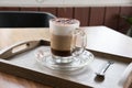 Cup of cappuccino coffee, hot mocha drink with cinnamon and coco Royalty Free Stock Photo