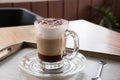 Cup of cappuccino coffee, hot mocha drink with cinnamon and coco Royalty Free Stock Photo