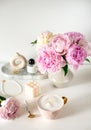 Cup with cappuccino, flowers peony