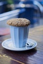 Cup of cappuccino with oat cookie