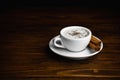 Cup of Cappucino Italian Coffee with Cinnamon Sticks. Copy Space Royalty Free Stock Photo