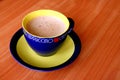 A cup of capuccino.