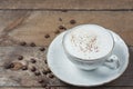 A cup of Capuchino coffee in a white cup Royalty Free Stock Photo