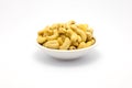 A cup of cashew nuts on white background Royalty Free Stock Photo
