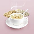 Cup of cereal on color background Royalty Free Stock Photo