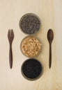 Cup of cereal grain seeds and napkin,spoon ,fork