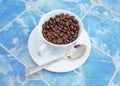 Cup of coffe beans Royalty Free Stock Photo