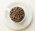 Cup of coffe beans Royalty Free Stock Photo