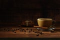 Cup of coffe Cappuccino with milk on a dark background. Hot coffe ,latte or Cappuccino prepared with milk on a wooden table with