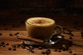 Cup of coffe Cappuccino with milk on a dark background. Hot coffe ,latte or Cappuccino prepared with milk on a wooden table with