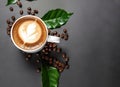 Cup of coffe with coffee beans and green leaves on black background Festive AI Generated Royalty Free Stock Photo